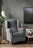 Sillón orejero Low Cost gris con vivo contrastado en un salón